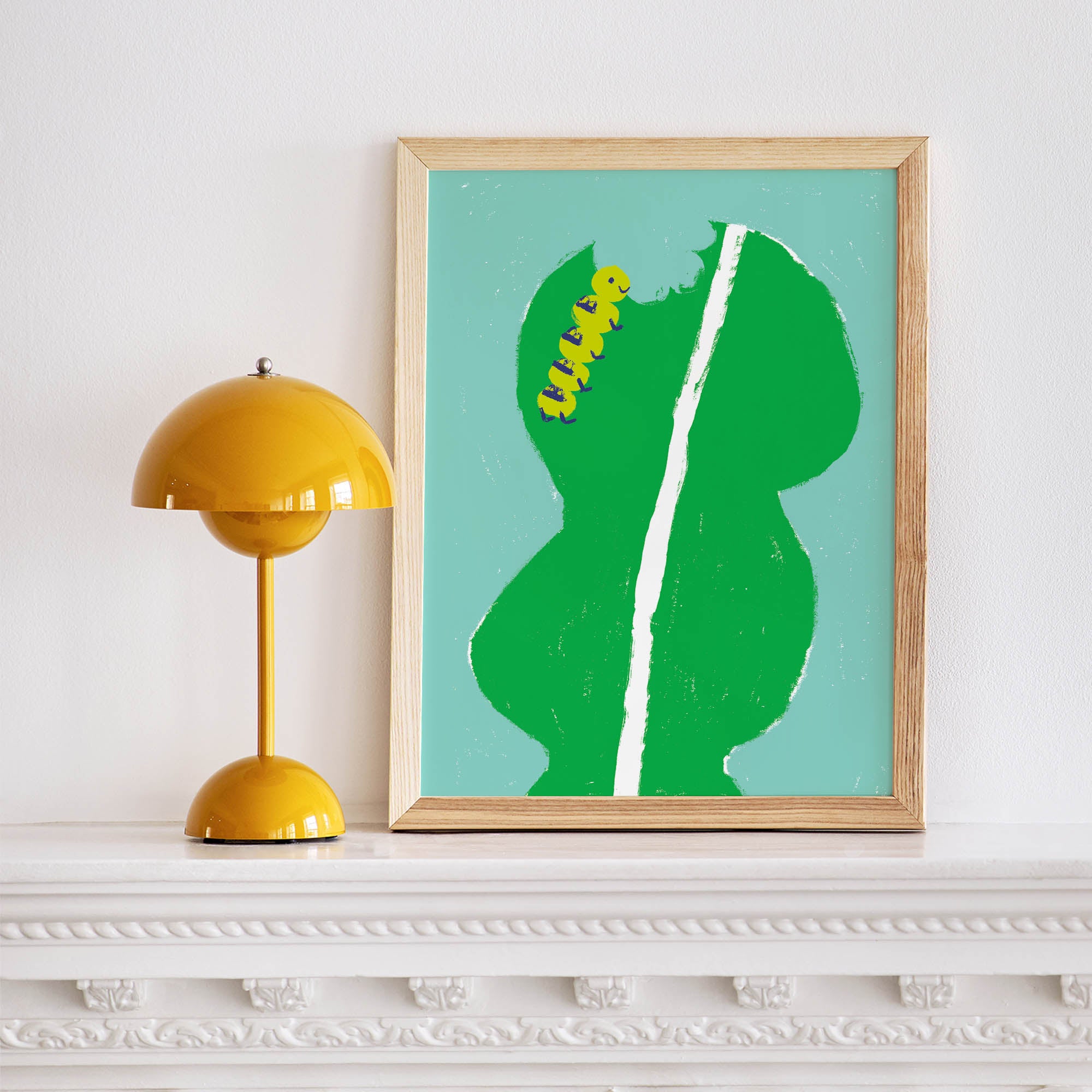 Caterpillar Munching on Leaf Framed Fine Art Print | Cara Rooney